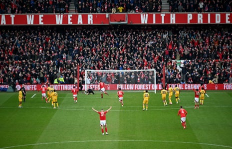 Chris Wood of Nottingham Forest celebrates scoring his team’s fifth goal – and his hat-trick –from the penalty spot against Brighton