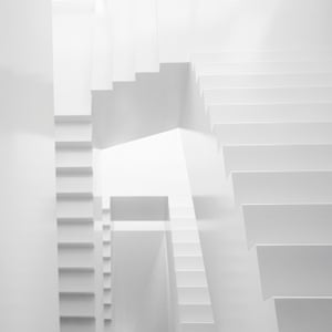 Black and white category runner-up ‘Boxed irregularities’ shows a white, winding staircase