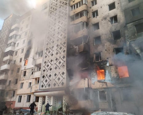 Residents walk in front of an apartment building which was damaged during a morning Russian missile strike, amid Russia’s attack on Ukraine, in Ternopil, Ukraine.