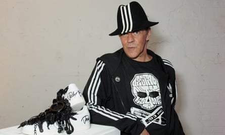 Judy Blame poses with his design at an auction in support of Stonewall in London in 2013.