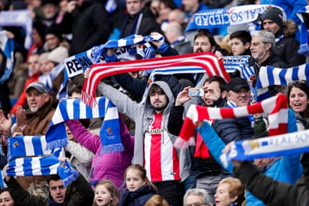 Supporters of Real Sociedad and Athletic Bilbao mixing during games