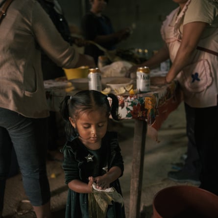 Anayanzi Salvador (2) tries to make tamales