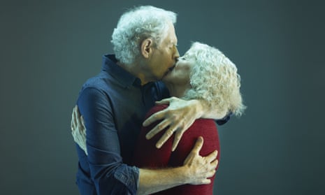 A senior couple kissing