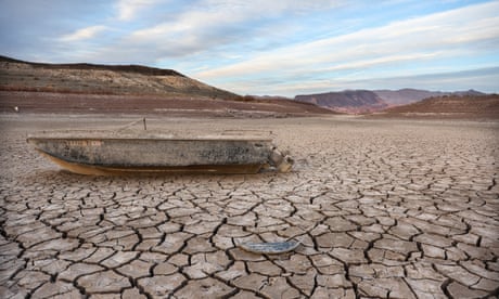 A formerly sunken boat rests on a now-dry section of lakebed at the drought-stricken Lake Mead, Nevada.