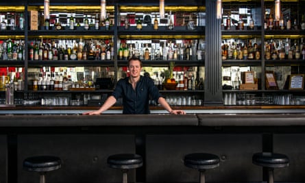 Owner, Ross Simon, stands behind the bar at Bitter & Twisted Cocktail Parlour, Phoenix, Arizona, US.