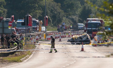 Emergency services attending the scene on 22 August 2015 on the A27 as after a plane crashed into cars during an aerial display at the Shoreham airshow in West Sussex. 