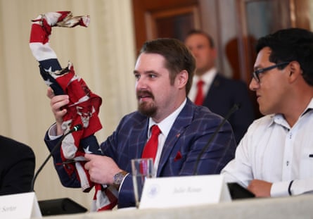 Right-wing influencer Nick Sortor showed off the partially burned American flag he took from a protester in Portland at the White House.