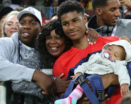 Marcus Rashford of England joins his family following the 2018 FIFA World Cup Russia Round of 16 match between Colombia and England at Spartak Stadium on July 3, 2018 in Moscow, Russia.
