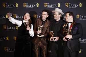 Lizzie Gillett, Robert Ford, Ian Bonhôte and Peter Ettedgui pose in the press room after winning the best documentary award for Super/Man: The Christopher Reeve Story