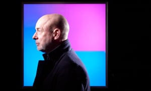 Brian Eno photographed in front of one of his light installations at his studio in Notting Hill, London
