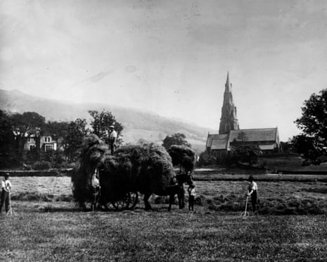 Workers making hay near St Mary's Church, Ambleside, circa 1910