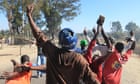 Zimbabwe police battle with rioters protesting against 'harassment'