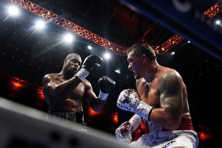 Daniel Dubois (left) and Oleksandr Usyk in action at Wembley