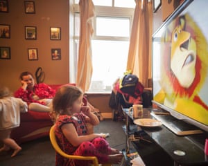 Poppie watching TV with Emma and Pennie behind, Darwen, Oct 2018