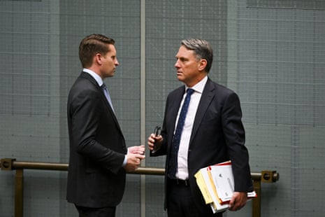 Coalition defence spokesperson Andrew Hastie, left, speaks with defence minister Richard Marles