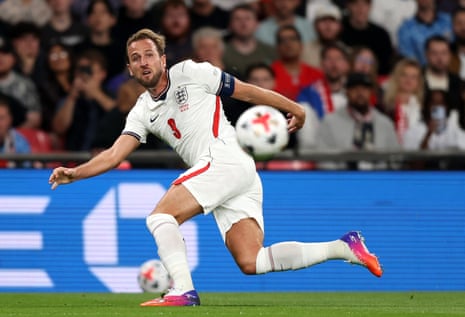 Harry Kane of England crosses the ball in the build up to his team's first goal.