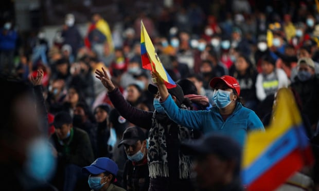 A demonstrator waves an Ecuadorian flag during a cultural festival amid a stalemate between the government of President Guillermo Lasso and largely indigenous demonstrators, in Quito, on Sunday.