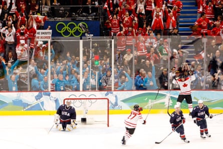 Canada’s Sidney Crosby (right, in white) celebrates after scoring the game winning goal in overtime of the ice hockey men’s gold medal game against USA at the 2010 Winter Olympics in Vancouver.