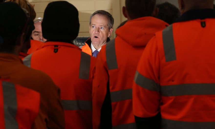 Bill Shorten addresses the workers at the Bombardier factory in Dandenong. Labor has discussed pegging the minimum wage to median earnings to address inequality.