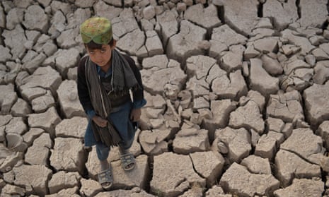 A child standing on dry land in Badghis province, Afghanistan, 15 October.