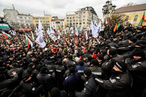 Sofia, Bulgaria. Protesters clash with police officers as they try to enter the parliament building during a demonstration against the Covid-19 health pass