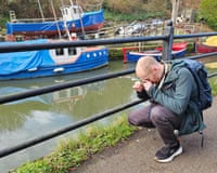 James hunkers down to examine green field-speedwell