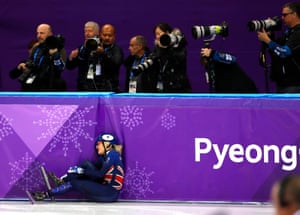 Great Britain’s Elise Christie crashes and is then disqualified. She has failed to finish a race at the Winter Olympics six times now.