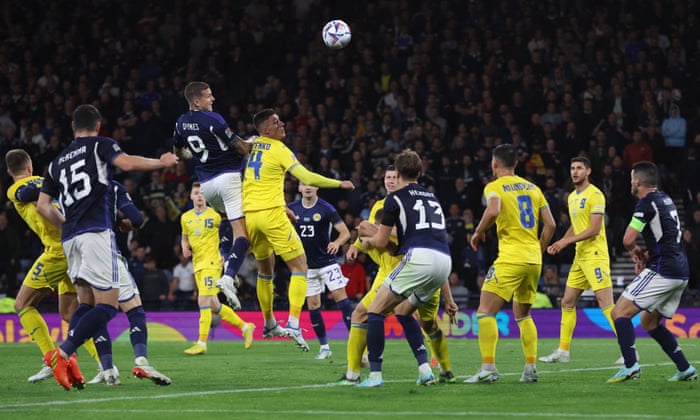 Lyndon Dykes sends a looping header goalwards to score his second, and Scotland’s third goal of the game.