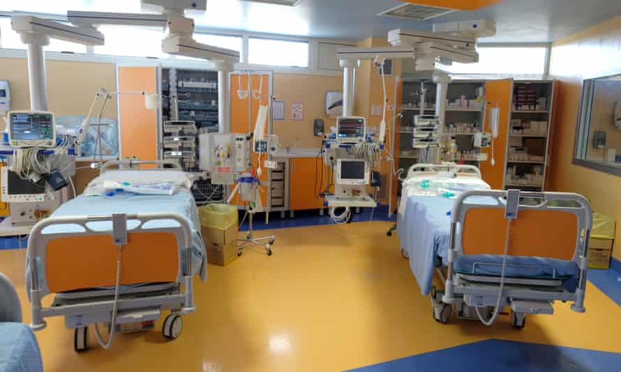 Two beds are seen during a tour for the media of ICU positions for coronavirus patients inside a private clinic in Rome.