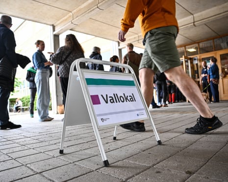People queue to vote for Sweden’s general election at a polling station in Stockholm, Sweden.