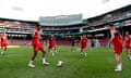 Liverpool players take part a warm-up at Fenway Park in Boston before a 2019 pre-season friendly with Sevilla.