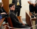 a man sits in court