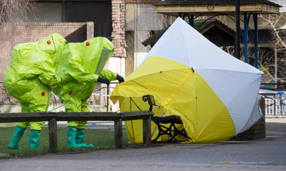 Police in hazmat suits in Salisbury after the poisoning  in 2018