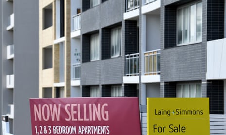 For Sale signs are seen outside a unit block in Sydney, October 28, 2020.