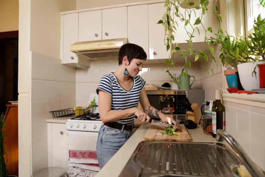 Jane Newton prepares her lunch while working from home.