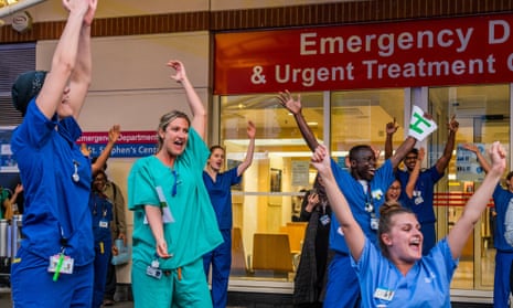 Staff at Chelsea and Westminster hospital, London, being applauded by the public last Thursday.