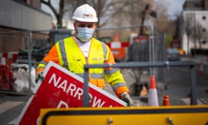 A construction worker wearing a protection face mask in Westminster, London as the UK continues in lockdown to help curb the spread of the coronavirus.