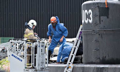 Depth charge: Danish police investigate the recovered submarine Nautilus UC3 in Copenhagen harbour. Peter Madsen is accused of murdering Kim Wall on board.