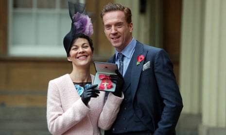 Helen McCrory shows off her OBE with Damian Lewis