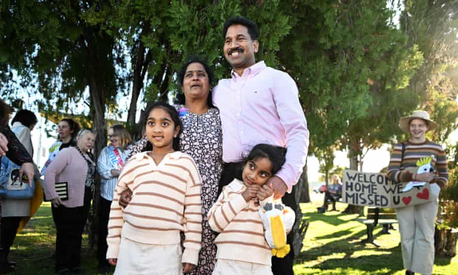 The Nadesalingam family after arriving home in Queensland