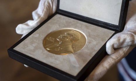 A Nobel prize medal. The scheme covered Nobel winners in the fields of physics, chemistry or medicine as well as some other prestigious awards.