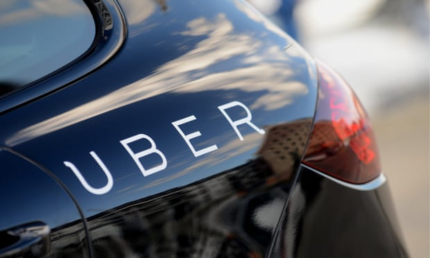 Uber ridesharing logo on car
