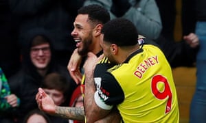 Andre Gray is congratulated by Troy Deeney after scoring Watford’s second goal against Crystal Palace