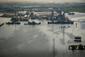 An aerial view of flooded fields and factories in the municipality of Conselice