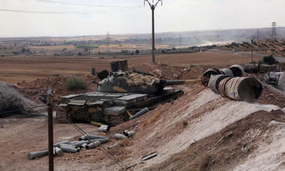 A Syrian army tank is seen on the southern outskirts of Aleppo.