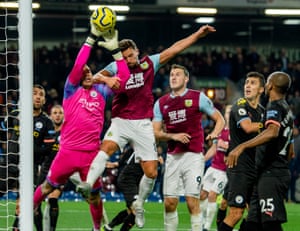 Ederson colects under pressure from Drinkwater.