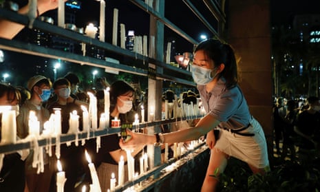 Protesters in Hong Kong take part in a vigil to mark the 31st anniversary of the crackdown of pro-democracy protests at Beijing’s Tiananmen Square.