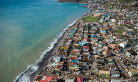 Aerial view of Roseau, capital of the Caribbean island of Dominica, shows destruction on 21 September, 2017, three days after the passage of Hurricane Maria.