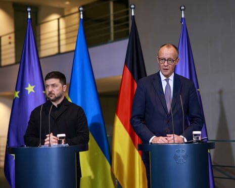German chancellor Friedrich Merz (R) and Ukrainian President Volodymyr Zelenskyy (L) attend a press conference at the Chancellery in Berlin, Germany.
