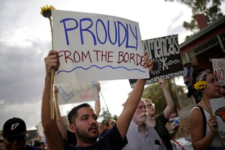 People take part in a rally against hate a day after a mass shooting at a Walmart store, in El Paso, Texas.